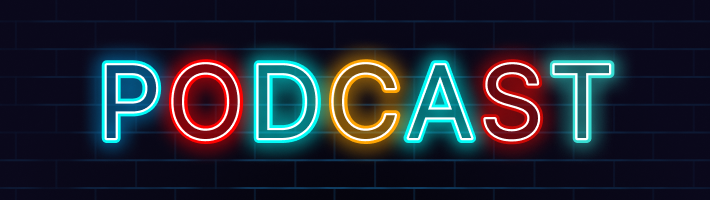 Neon sign reading 'PODCAST' in multicolored letters on a dark brick wall.